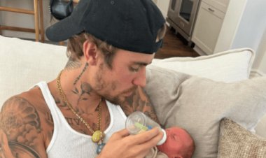 Ifoto ya Justin Bieber ateruye uruhinja yarikoroje ku mbuga nkoranyambaga